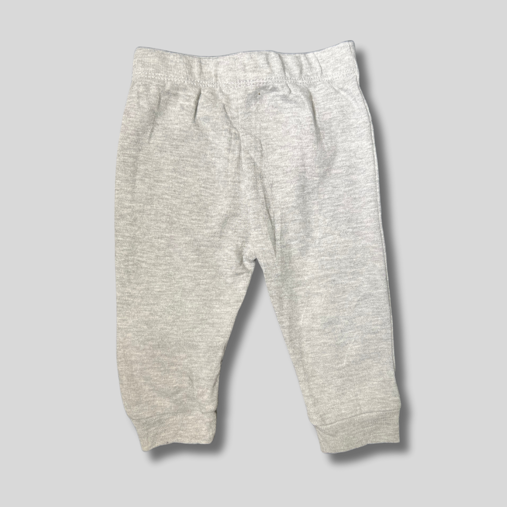 Pantaloni cu model genunchi