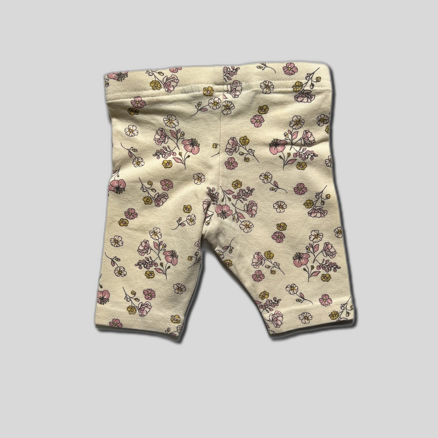 Pantaloni bej cu flori
