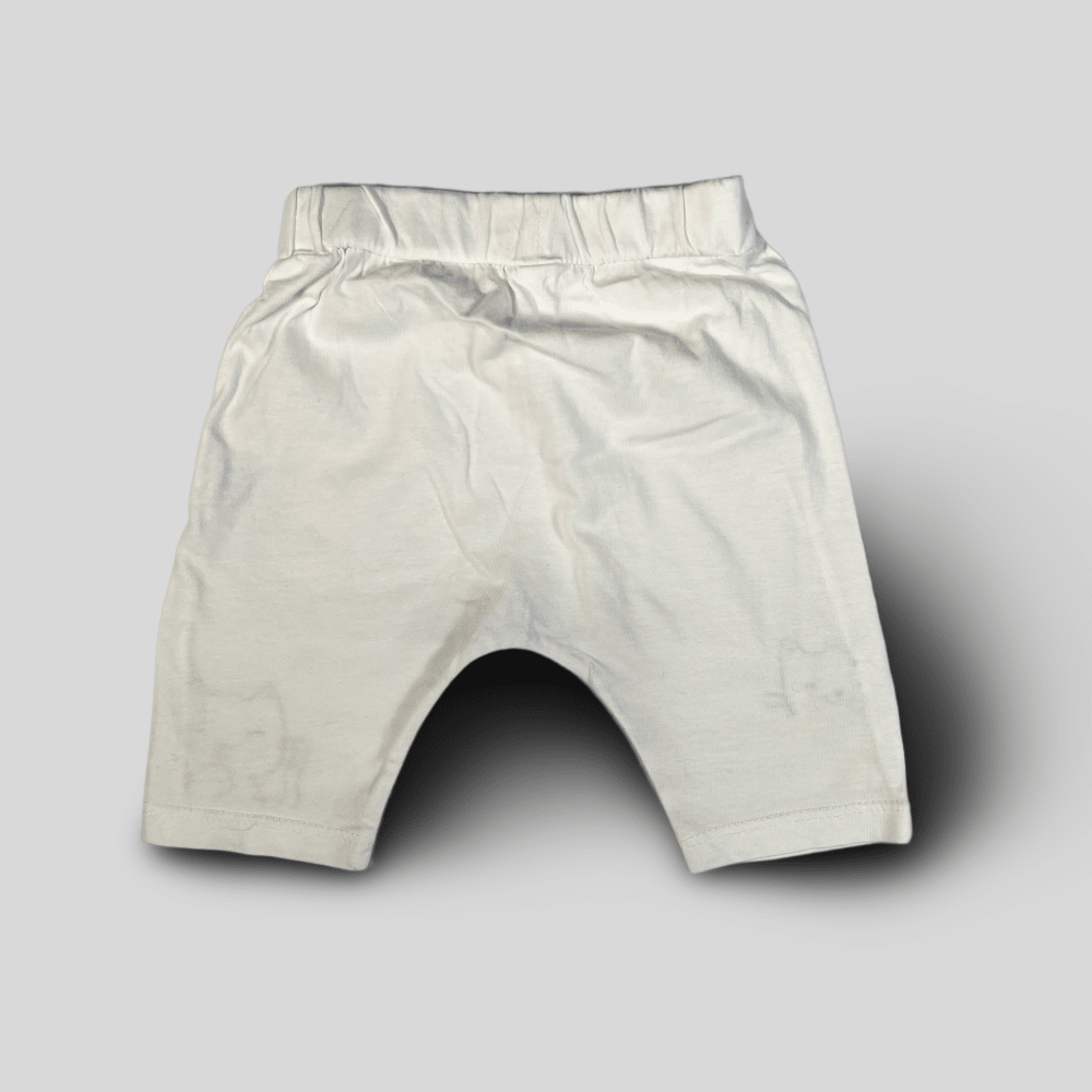 Pantaloni albi cu pisici