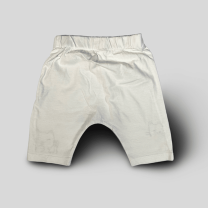Pantaloni albi cu pisici